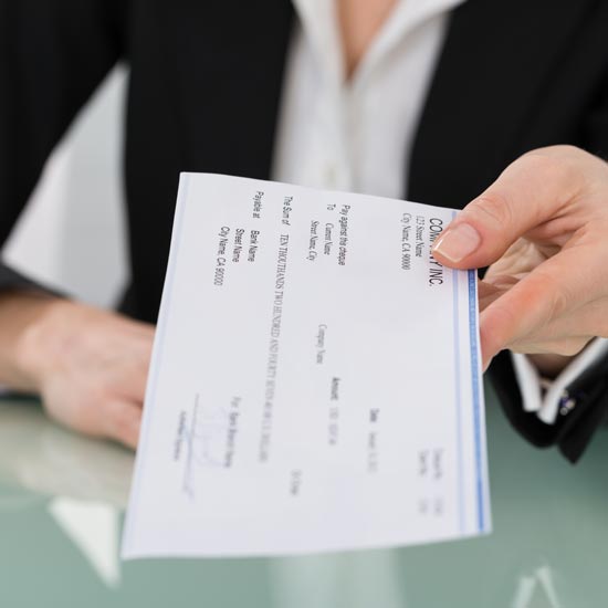person holding a check